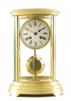 Lot 1398 - A 19TH CENTURY FRENCH BRASS OVAL FOUR GLASS MANTEL CLOCK