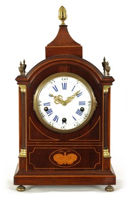 Lot 740 - AN EDWARDIAN INLAID MAHOGANY THREE TRAIN QUARTER STRIKING MANTEL CLOCK