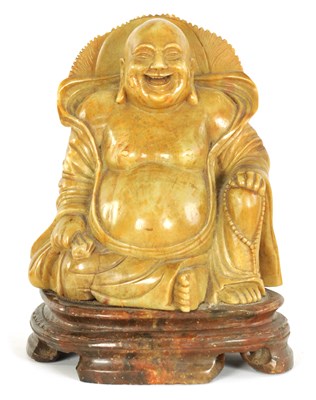 Lot 74 - A CHINESE CARVED SOAPSTONE SCULPTURE
