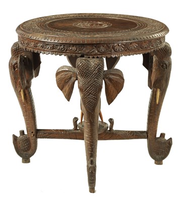 Lot 1008 - A LATE 19TH CENTURY CARVED INDIAN ELEPHANT TABLE