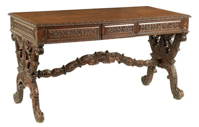 Lot 80 - A REGENCY ANGLO INDIAN CARVED HARDWOOD LIBRARY TABLE