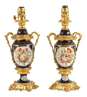 Lot 68 - A PAIR OF 19TH CENTURY CONTINENTAL ORMOLU MOUNTED PORCELAIN LAMP BASES