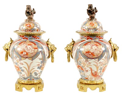 Lot 101 - A PAIR OF 18TH CENTURY JAPANESE IMARI VASES AND COVERS WITH ORMOLU MOUNTS