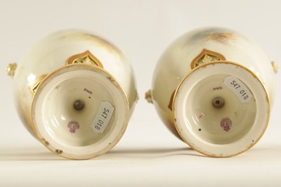 Lot 43 - HARRY STINTON. A FINE PAIR OF ROYAL WORCESTER OVOID PEDESTAL CABINET VASES AND COVERS