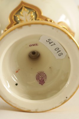 Lot 43 - HARRY STINTON. A FINE PAIR OF ROYAL WORCESTER OVOID PEDESTAL CABINET VASES AND COVERS