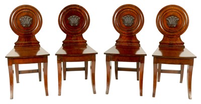Lot 958 - A SET OF FOUR LATE REGENCY MAHOGANY IRISH HALL CHAIRS