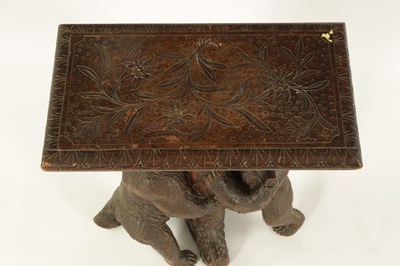 Lot 598 - A FINE 19TH CENTURY BLACK FOREST CARVED LINDEN WOOD DOUBLE BEAR OCCASIONAL TABLE / STOOL