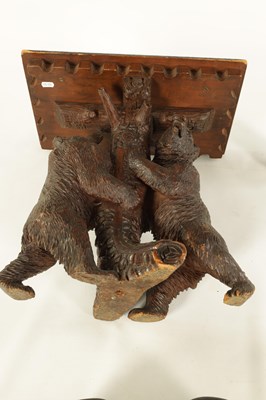 Lot 598 - A FINE 19TH CENTURY BLACK FOREST CARVED LINDEN WOOD DOUBLE BEAR OCCASIONAL TABLE / STOOL