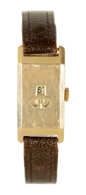 Lot 283 - A 1920’s JUMPING HOUR 9CT GOLD WRIST WATCH