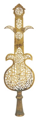 Lot 207 - A LARGE INDIAN BRASS ALAM WITH CUT CALLIGRAPHIC INSCRIPTIONS
