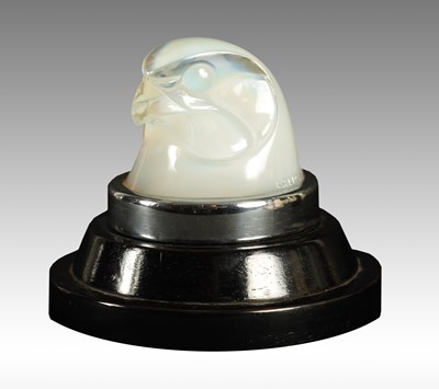 Lot 18 - A LALIQUE FRANCE OPALESCENT GLASS ‘TETE D’EPERVIER’ CAR MASCOT