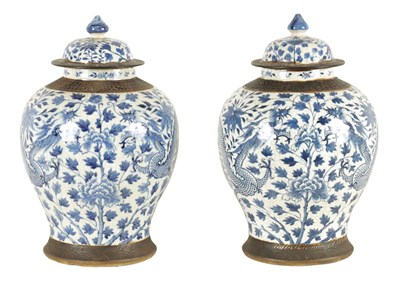 Lot 92 - A LARGE PAIR OF 19TH CENTURY CHINESE BLUE AND WHITE CRACKLE GLAZE SHOULDERED VASES AND COVERS