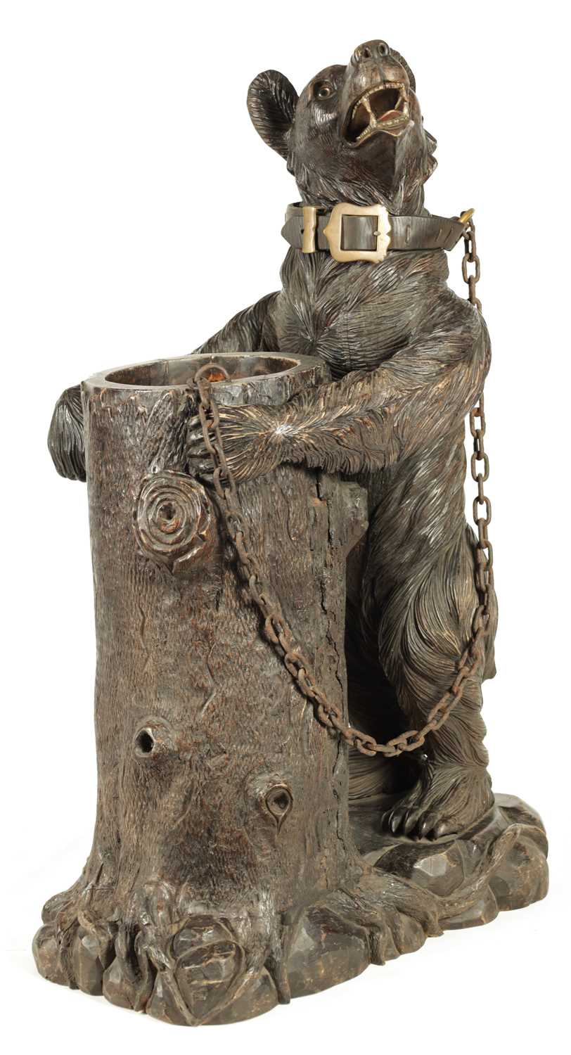 Lot 600 - AN IMPRESSIVE 19TH CENTURY LINDEN WOOD BLACK FOREST CARVED BEAR STICK STAND