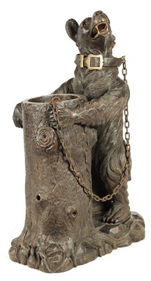 Lot 600 - AN IMPRESSIVE 19TH CENTURY LINDEN WOOD BLACK FOREST CARVED BEAR STICK STAND