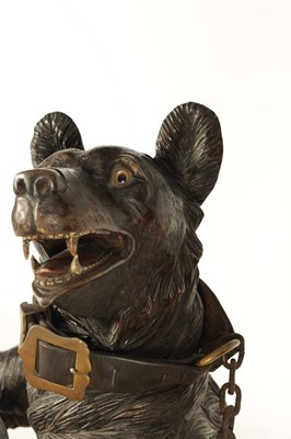 Lot 600 - AN IMPRESSIVE 19TH CENTURY LINDEN WOOD BLACK FOREST CARVED BEAR STICK STAND