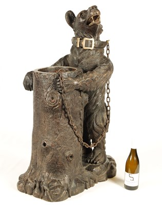 Lot 600 - AN IMPRESSIVE 19TH CENTURY LINDEN WOOD BLACK FOREST CARVED BEAR STICK STAND