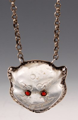 Lot 123 - A CHINESE ROCK CRYSTAL PENDANT formed as a...