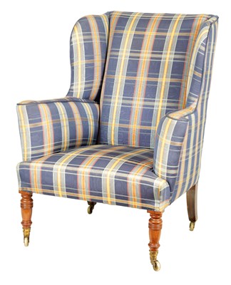 Lot 753 - A 19TH CENTURY MAHOGANY WING BACK UPHOLSTERED ARMCHAIR BY HOWARD AND SONS LONDON