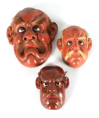 Lot 219 - A GROUP OF THREE JAPANESE MEIJI PERIOD LACQUER WORK FACE MASKS