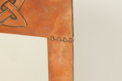 Lot 540 - ARCHIBALD KNOX (1864-1933) AN EARLY 20TH CENTURY COPPER FRAMED HANGING MIRROR