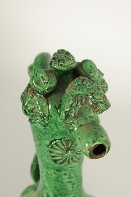 Lot 37 - AN OTTOMAN REVIVAL TURKISH GREEN GLAZED TERRACOTTA CANAKKALE EWER