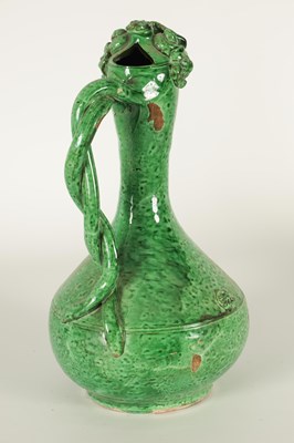 Lot 37 - AN OTTOMAN REVIVAL TURKISH GREEN GLAZED TERRACOTTA CANAKKALE EWER
