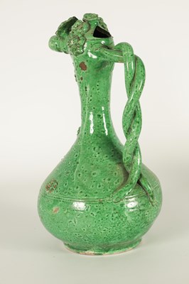 Lot 37 - AN OTTOMAN REVIVAL TURKISH GREEN GLAZED TERRACOTTA CANAKKALE EWER