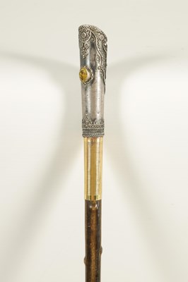Lot 449 - AN EARLY 20TH CENTURY RHINOCEROS HORN SWAGGER STICK