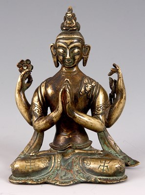 Lot 134 - A 18TH/19TH CENTURY CAST BRASS TIBETAN SEATED...