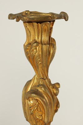 Lot 503 - A PAIR OF 19TH CENTURY FRENCH ROCOCO CAST GILT ORMOLU CANDLESTICKS
