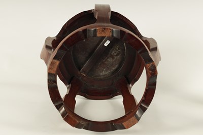 Lot 163 - A 19TH CENTURY CHINESE BURR HARDWOOD BARREL SHAPED OPENWORK STOOL