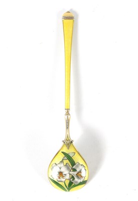 Lot 195 - AN EARLY 20TH CENTURY SILVER GILT AND ENAMEL SPOON