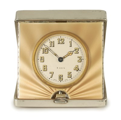 Lot 1015 - AN ART DECO SILVER AND GUILLOCHE ENAMEL TRAVELLING BOUDOIR CLOCK