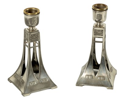 Lot 524 - A PAIR OF EARLY 20TH CENTURY WMF SECESSIONIST SILVER PLATED CANDLESTICKS