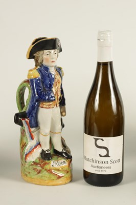 Lot 71 - A 19TH CENTURY POLYCHROME FIGURAL TOBY JUG DEPICTING ADMIRAL LORD NELSON