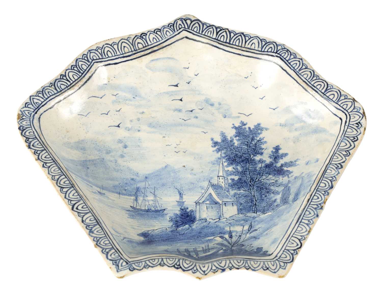 Lot 81 - AN 18TH/19TH CENTURY DELFT BLUE AND WHITE SHAPED SHALLOW DISH