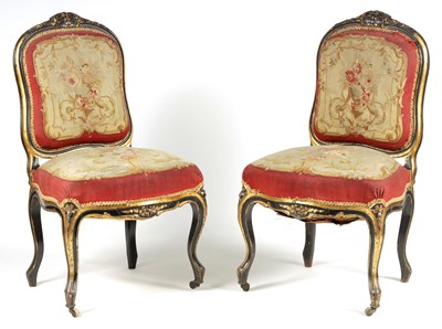 Lot 1125 - A PAIR OF 19TH CENTURY FRENCH EBONISED AND GILT SALON CHAIRS