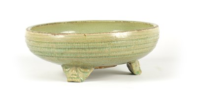 Lot 92 - AN EARLY CELADON MING DYNASTY TRIPOD BULB BOWL