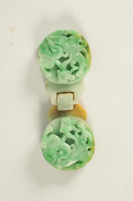 Lot 151 - A 19TH CENTURY CHINESE GREEN JADE CARVED BELT BUCKLE