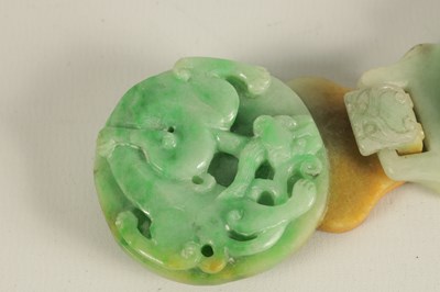 Lot 151 - A 19TH CENTURY CHINESE GREEN JADE CARVED BELT BUCKLE