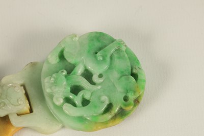 Lot 151 - A 19TH CENTURY CHINESE GREEN JADE CARVED BELT BUCKLE