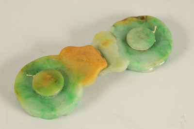 Lot 151 - A 19TH CENTURY CHINESE GREEN JADE CARVED BELT BUCKLE