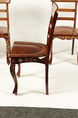 Lot 1046 - A FINE LATE 19TH/EARLY 20TH CENTURY IVORY AND EBONY INLAID HARDWOOD ANGLO INDIAN DINING ROOM TABLE AND SET OF TEN CHAIRS