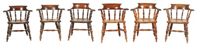 Lot 1052 - A GOOD MATCHED SET OF SIX MID 19TH CENTURY YEW-WOOD SMOKERS' BOW ARMCHAIRS