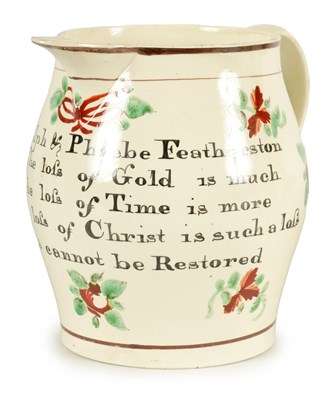 Lot 34 - AN EARLY 19TH CENTURY CREAMWARE PRESENTATION JUG