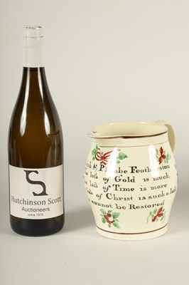 Lot 34 - AN EARLY 19TH CENTURY CREAMWARE PRESENTATION JUG