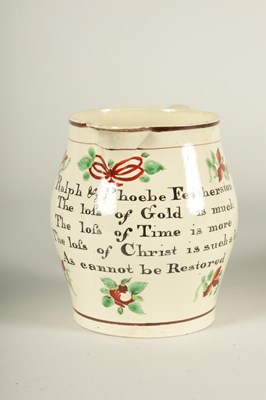 Lot 34 - AN EARLY 19TH CENTURY CREAMWARE PRESENTATION JUG