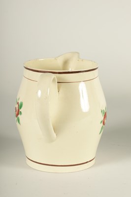 Lot 34 - AN EARLY 19TH CENTURY CREAMWARE PRESENTATION JUG