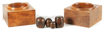 Lot 596 - A MATCHED PAIR OF 19TH CENTURY ELM CASH DISPENSERS