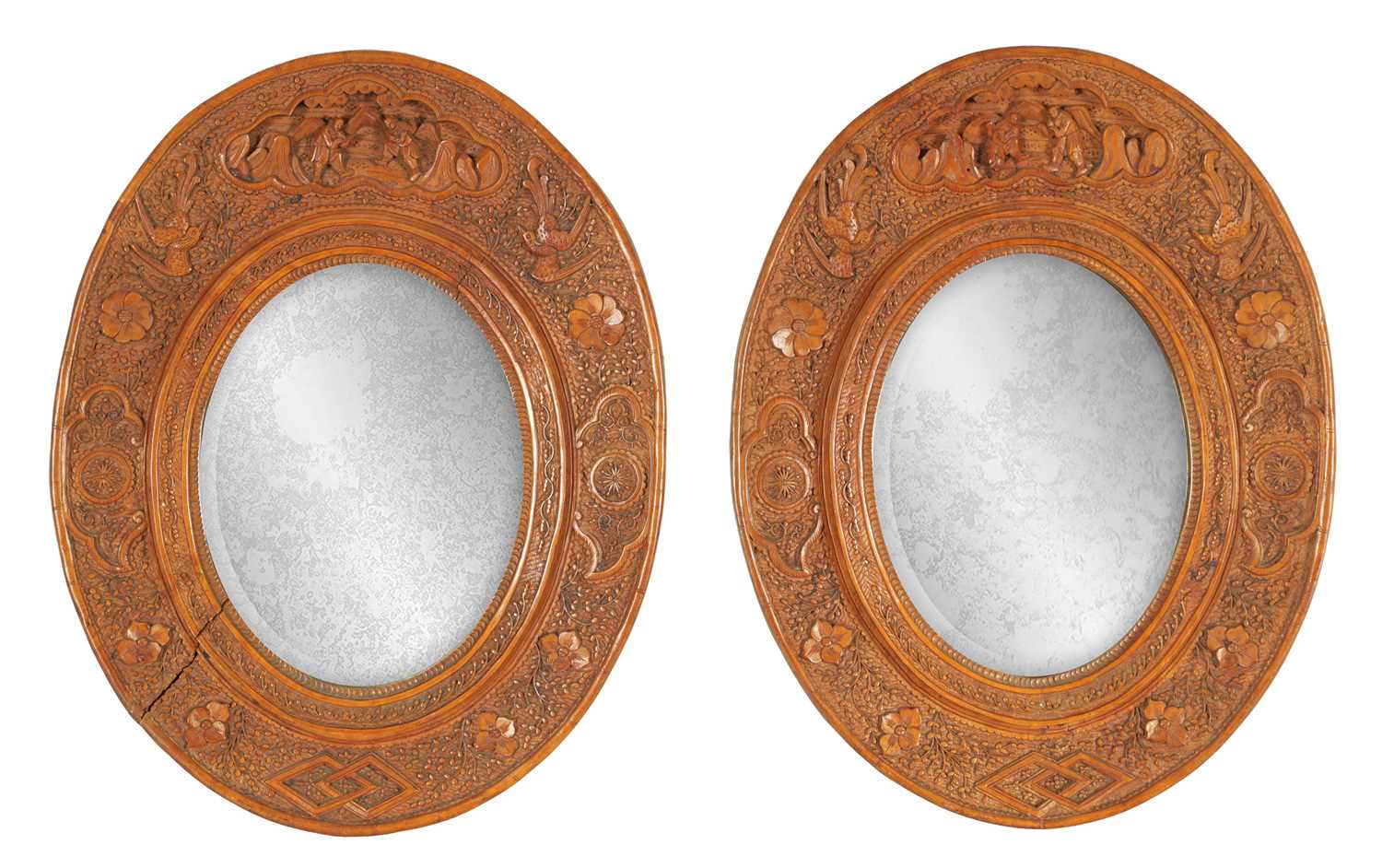 Lot 129 - A PAIR OF LATE 19TH CENTURY CHINESE CARVED BOXWOOD OVAL MIRRORS